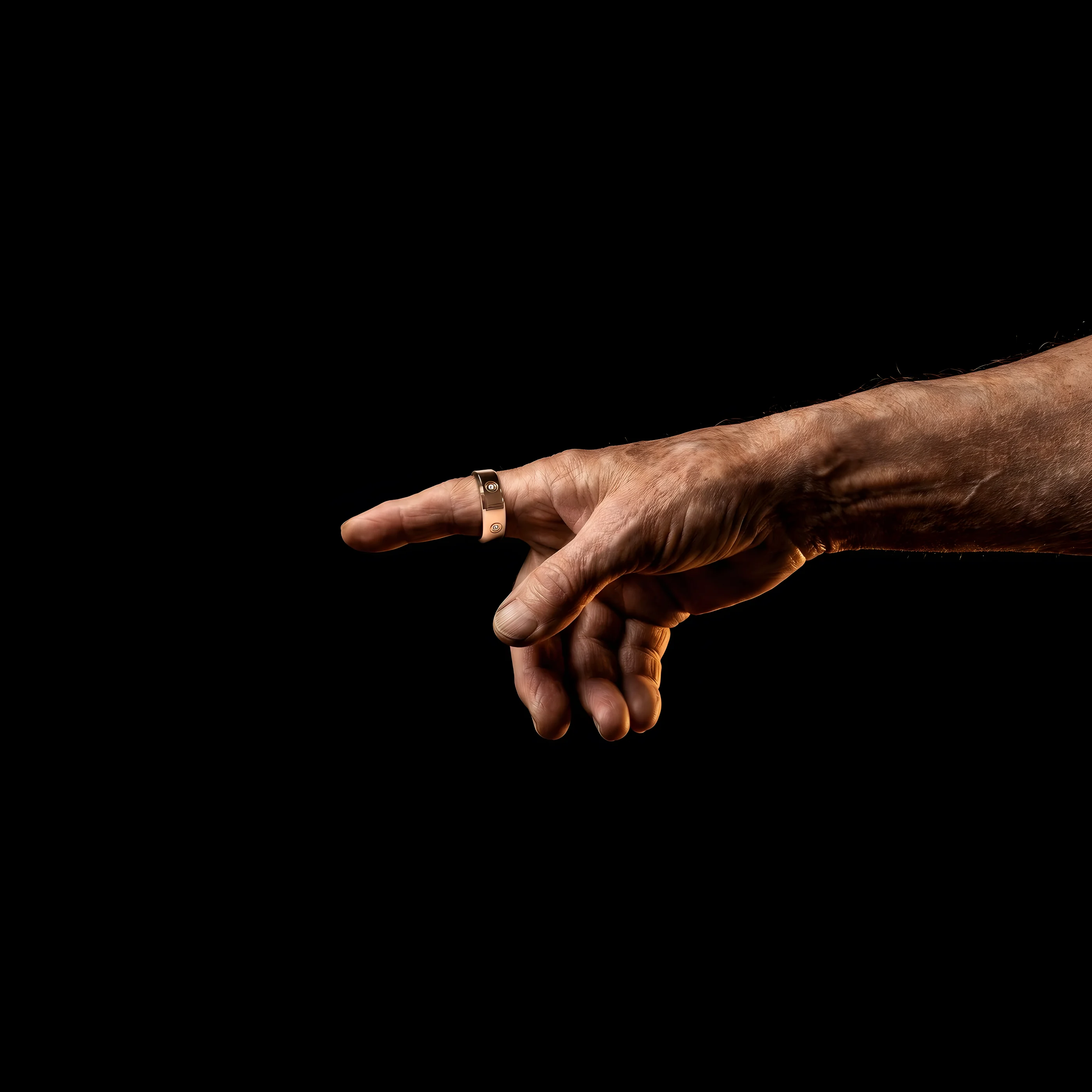 An older hand wearing the LuxenX ring, reaching back
